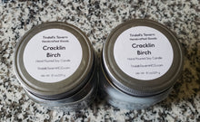Cracklin Birch Soy Candle that is gray in color in a 8 oz Mason jar with a pewter lid.