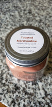 Toasted Marshmallow Soy candle that is brown in color in an 8 oz Mason jar with a pewter lid.