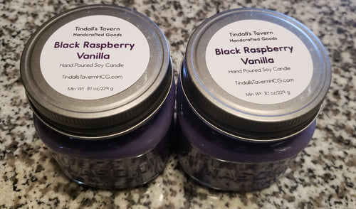 Purple Black Raspberry Vanilla Soy Candles in an 8 oz Mason jar with a pewter lid.