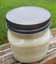 White Soy candle in an 8 oz Mason jar with a pewter lid.