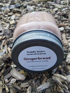Gingerbread Soy Candle that is brown in color in an 8 oz Mason jar with a pewter lid.
