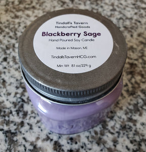 Blackberry Sage Soy candle that is purple in color in an 8 oz Mason jar with a pewter lid.