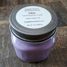 Lilac Soy candle that is purple in color in an 8 oz Mason jar with a pewter lid.