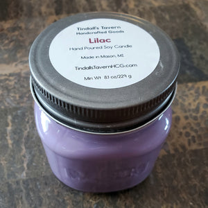 Lilac Soy candle that is purple in color in an 8 oz Mason jar with a pewter lid.