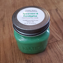 Spearmint & Eucalyptus Soy candle that is green in color in an 8 oz Mason jar with a pewter lid.