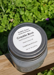 Cracklin Birch Soy candle that is gray in color in an 8 oz Mason jar with a pewter lid.