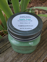 Apple Sage Soy candle that is green in color in an 8 oz Mason jar with a pewter lid.