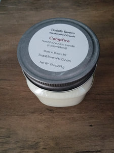 Campfire Soy candle that is white in color in an 8 oz Mason jar with a pewter lid.