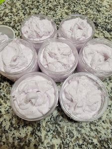 Seven jars of scrub packaged in a 4 oz jar, light purple in color.  