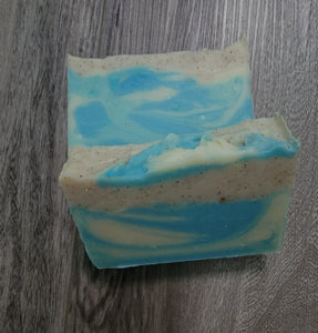 Blue and white soap with tan speckles to look like sand. Minimum soap weight is 3.8 oz.
