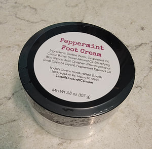 Peppermint foot cream in a 4 oz jar (net weight is 3.8 oz).  Cream is white in color.